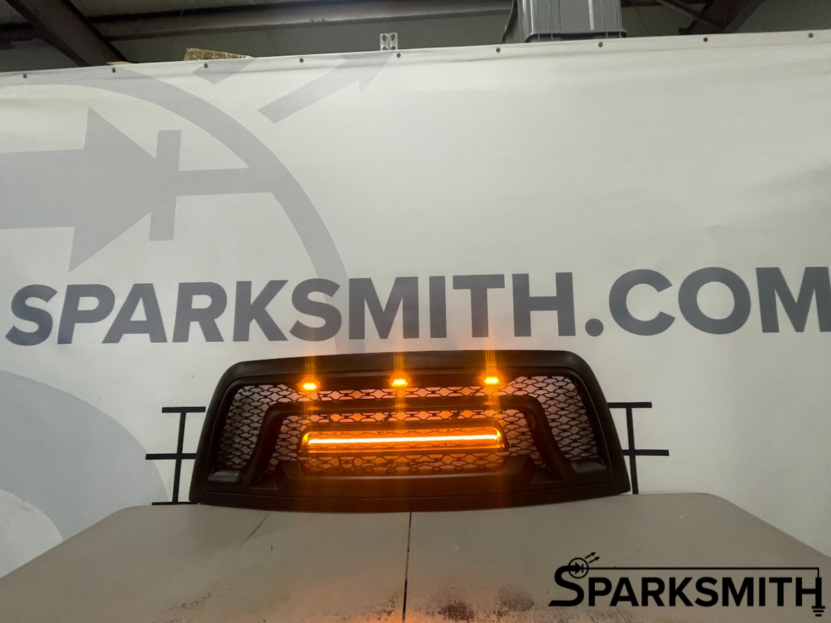 Grille+ 2013-2018 Dodge RAM 1500 Rebel Style Grille w/ Amber LED Lights