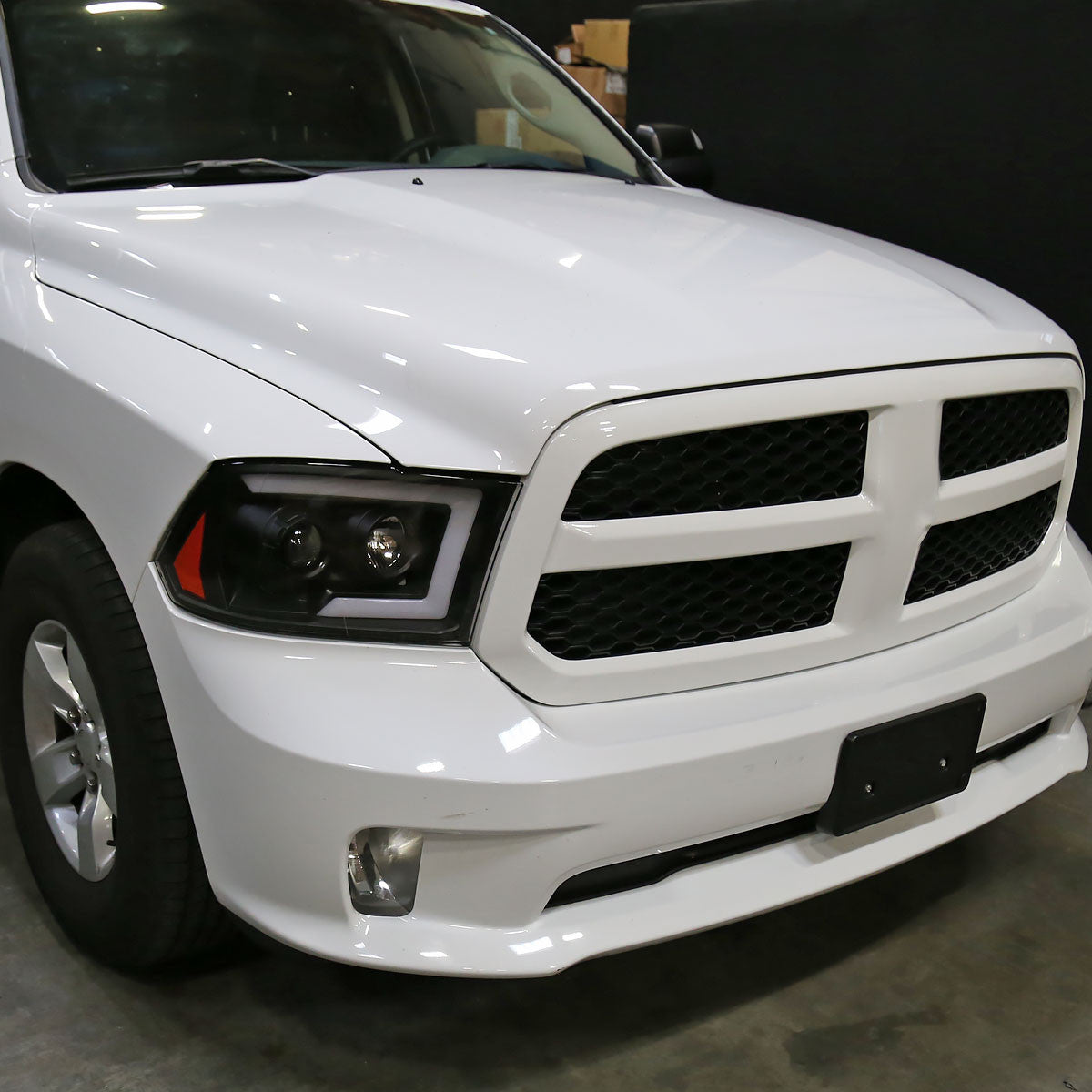 2009-2018 Dodge RAM 1500 / 2019-2021 RAM Classic/ 2010-2018 RAM 2500 3500 Switchback Sequential LED C-Bar Projector Headlights (Matte Black Housing/Clear Lens)