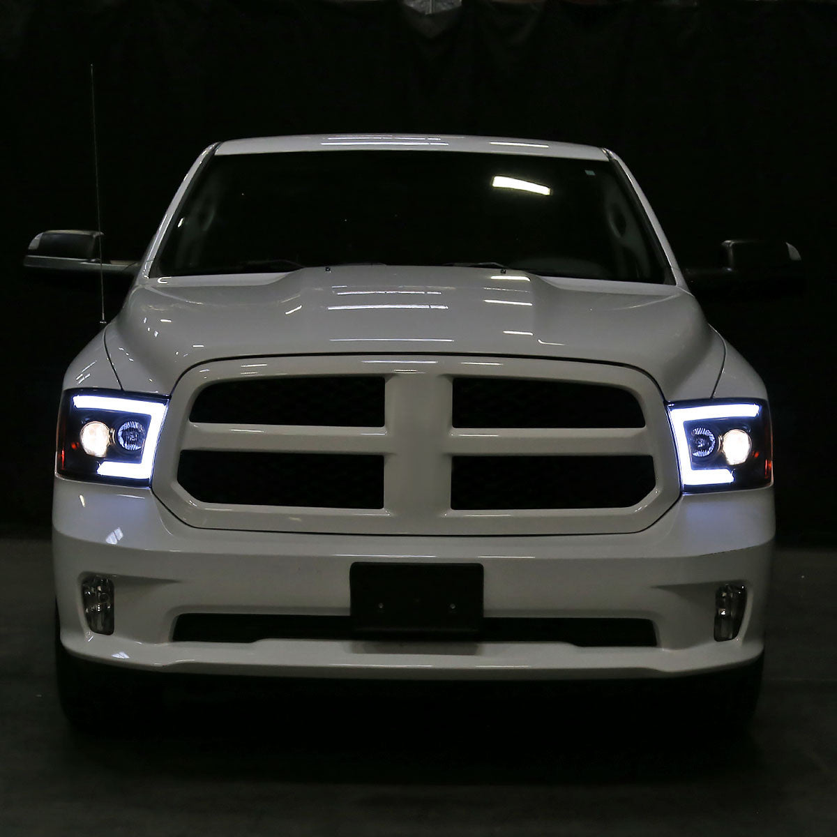 2009-2018 Dodge RAM 1500 / 2019-2021 RAM Classic/ 2010-2018 RAM 2500 3500 Switchback Sequential LED C-Bar Projector Headlights (Matte Black Housing/Clear Lens)