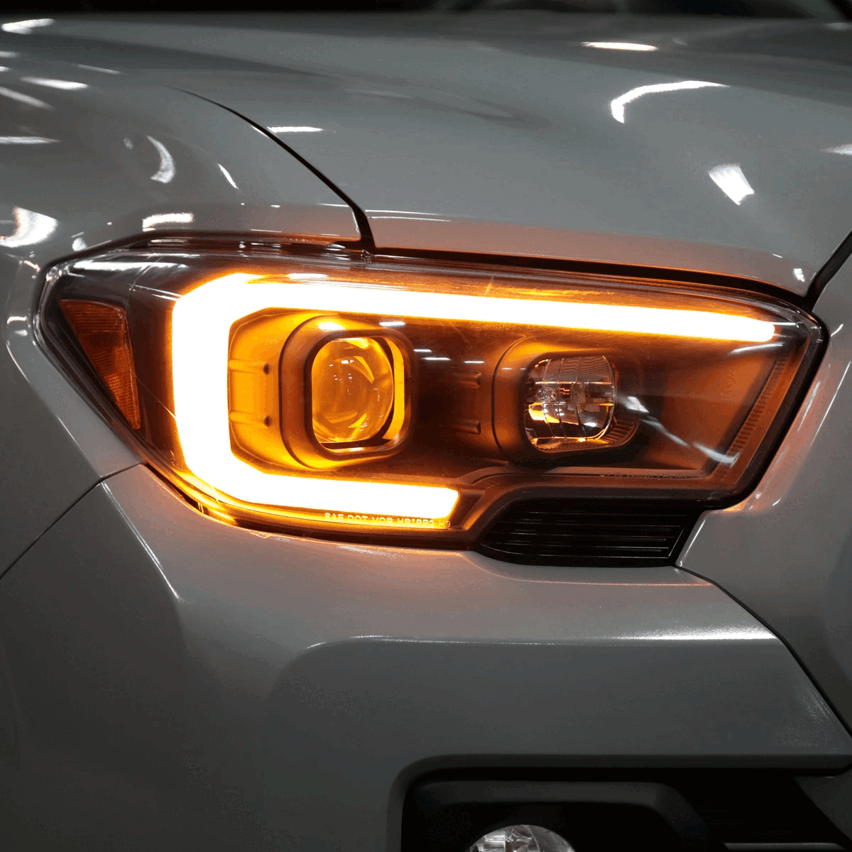2016-2023 Toyota Tacoma Switchback LED C-Bar Projector Headlights (Chrome Housing/Clear Lens)